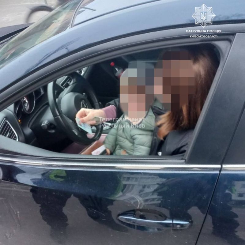 Ехала за рулем с маленьким ребенком на руках: в Борисполе вынесли постановление на женщину
