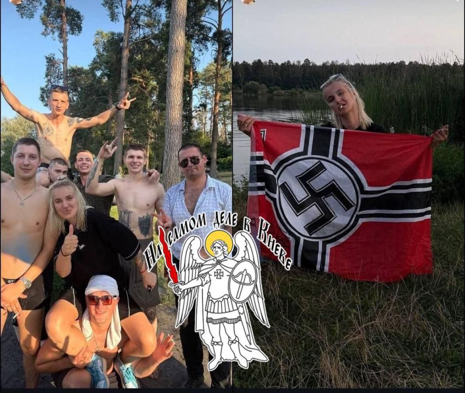 В интернете всплыли фото, где Анастасия Мирзак, секретарь из Святошинского суда Киева, запечатлена с флагом Третьего рейха