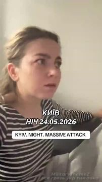 Украинка снимает свою реакцию на недавнюю ночную работу российских войск в Киеве