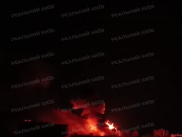 Ещё один момент ракетного удара в Киеве, и пожары в городе и области