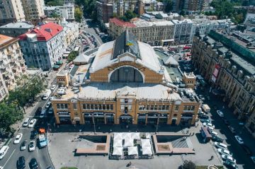 Киевские власти героически воюют с лишней буквой на Бессарабском рынке