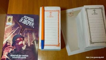 В "храме" раскольнической ПЦУ во Львове рядом с записками за здравие и за упокой лежит сатанинская реклама ВСУ, передает Мирослава Бердник